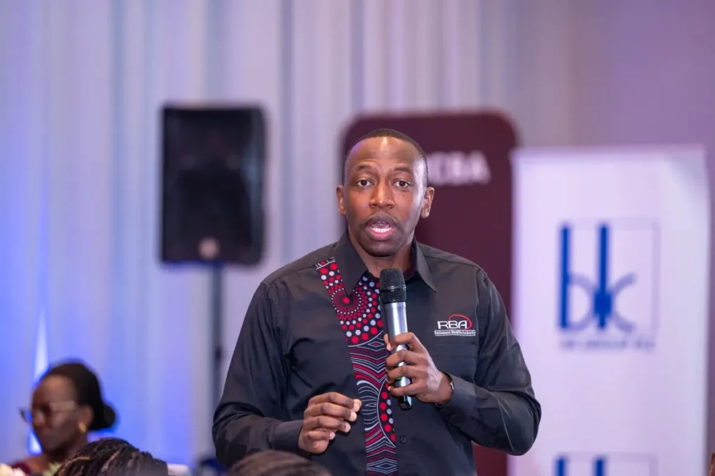 John Keah explaining retirement planning and pension savings in Kenya during audience engagement